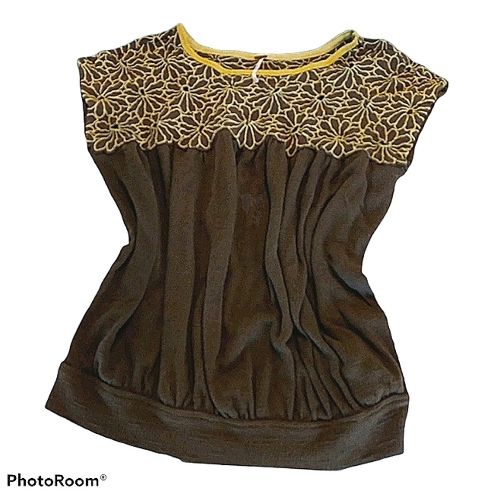 Free people green top with flowers on upper half s